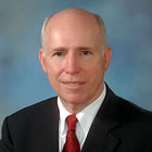 James E. Muller, MD
